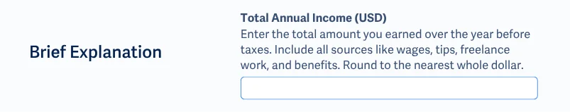 Kolom formulir berlabel 'Total Penghasilan Tahunan (USD)' dengan penjelasan singkat di atas input